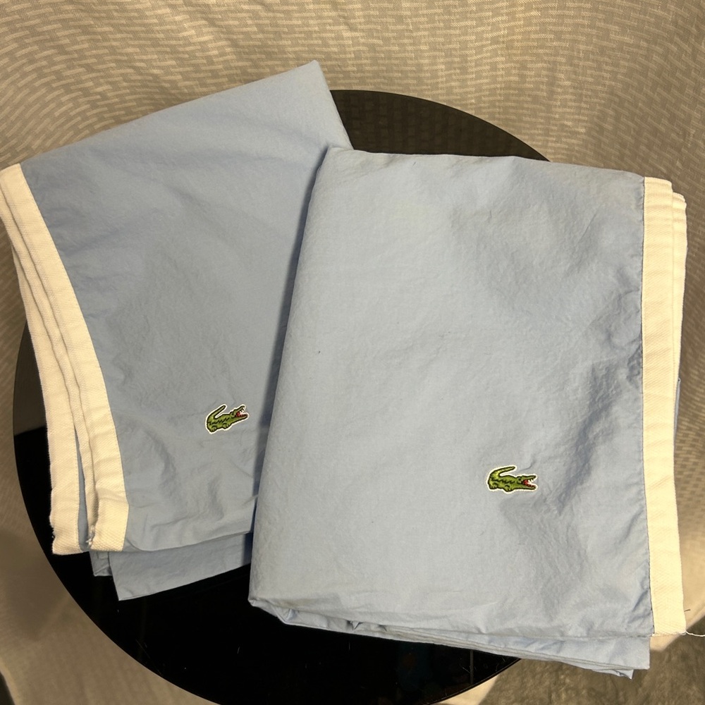 Lacoste (2) pillowcases. Pillow not included.